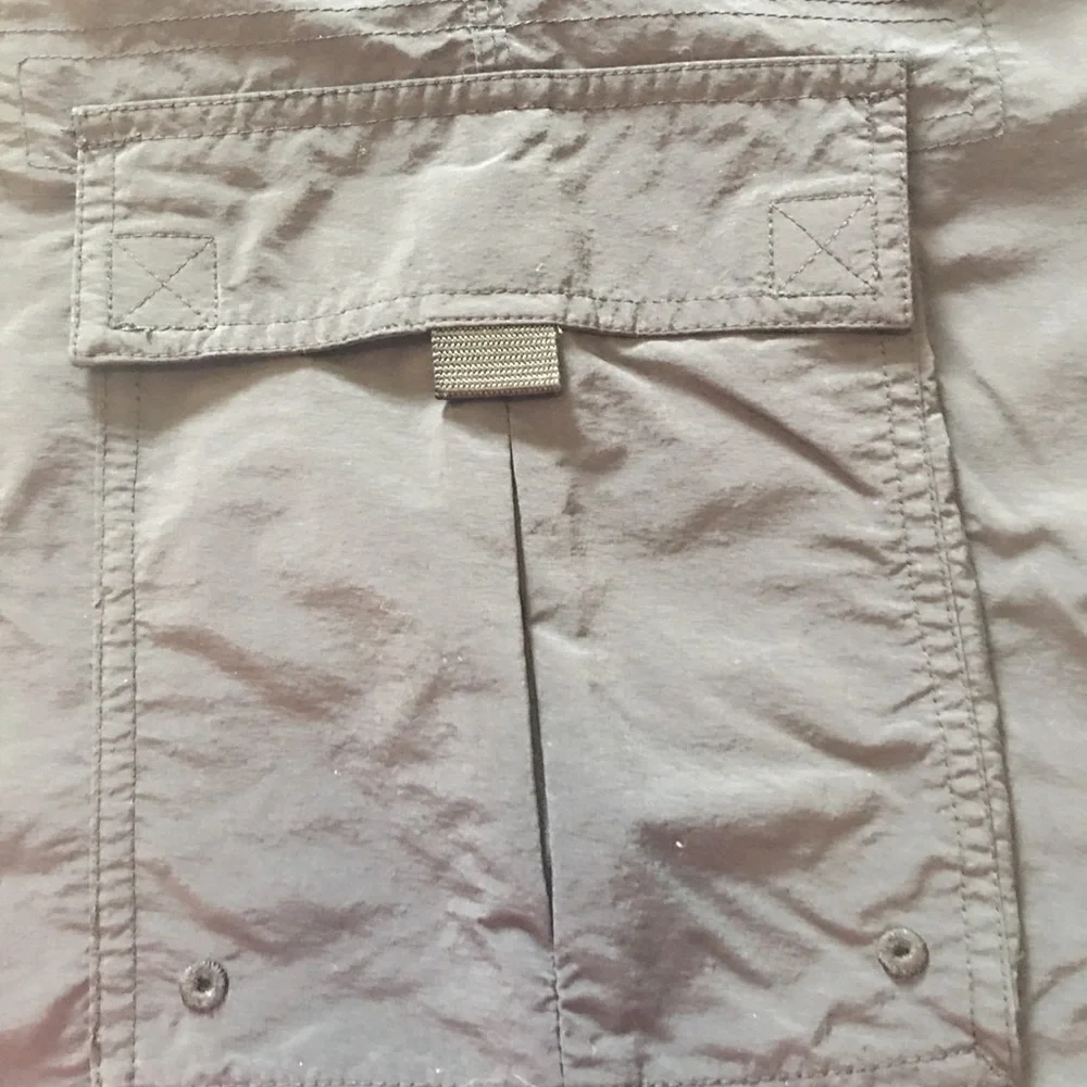 Men’s Columbia black swim trunks sz XXL. Net lined, zipper & Velcro pockets.